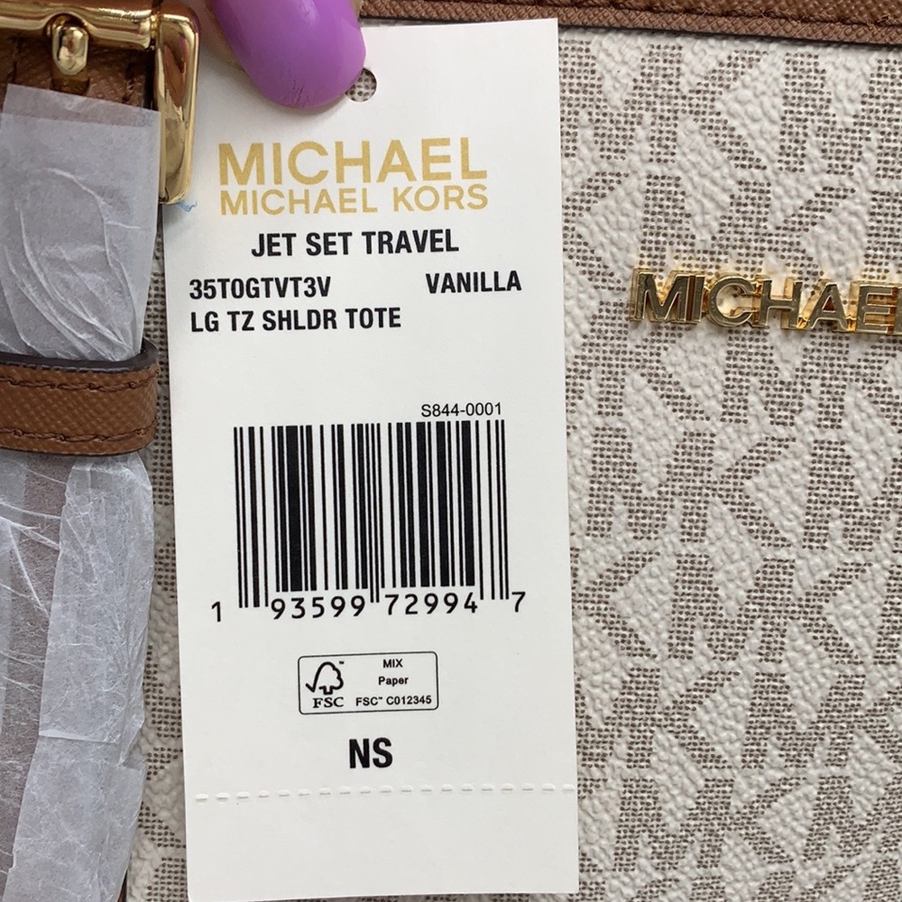 MICHAEL KORS
Jet Set Travel Large Logo Tote Shoulder Bag
COLOR VANILLA
NWT - Picture 13 of 16